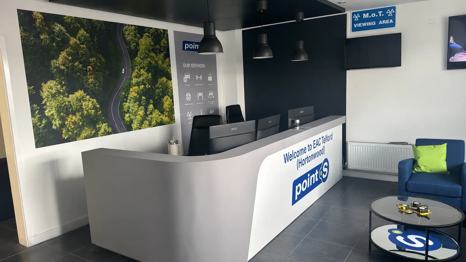 Reception desk at EAC Telford Hortonwood with a customer seating area